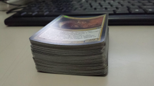 Posted on r/magicTCG: Is there a way to unbend stacks of foils? I have around five stacks of this size 