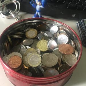 My collection of foreign coins leftover from trips. I reckon there’s at least a few thousand php worth in there; I’ll sort them out someday (Megaman for scale)